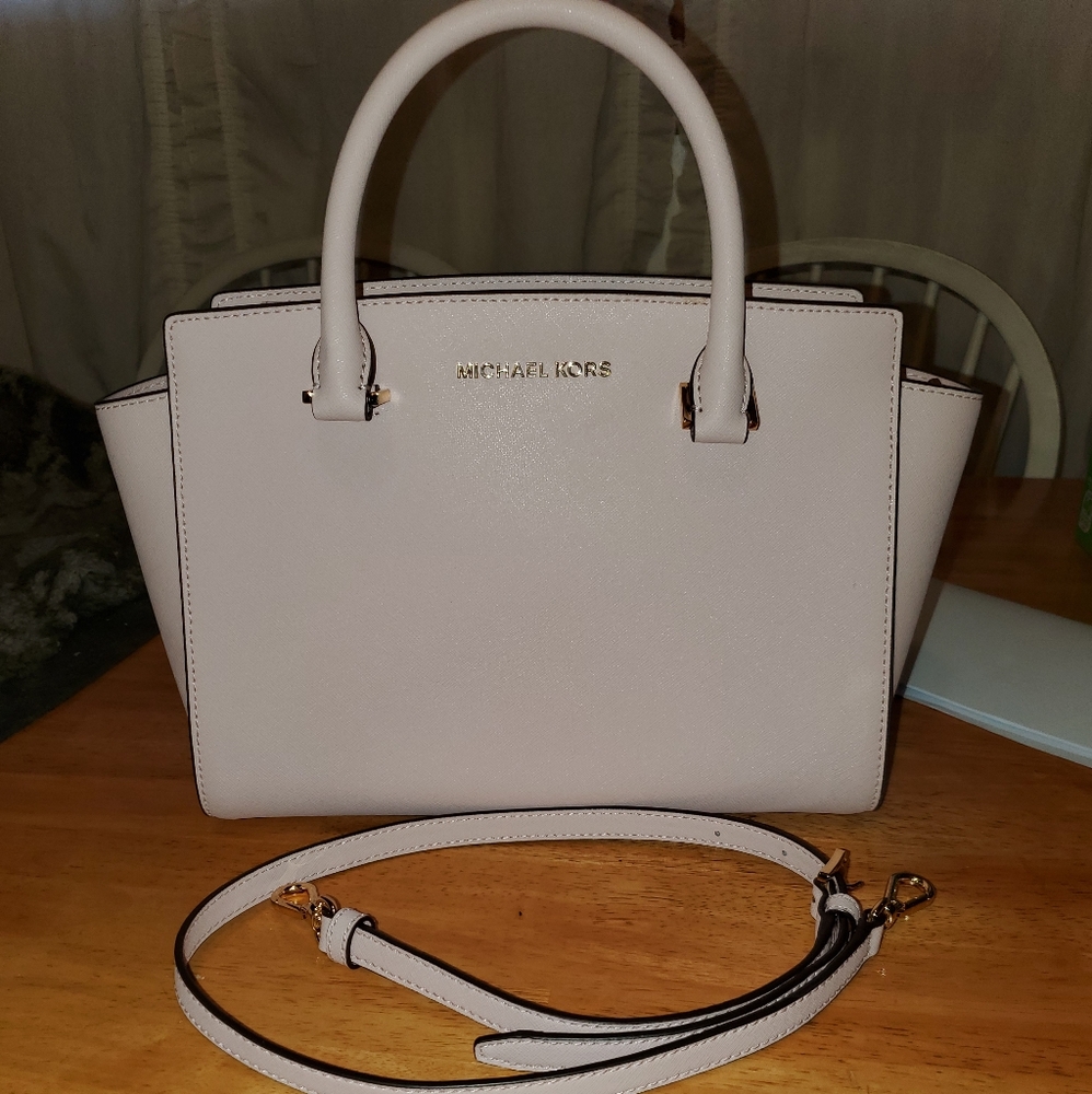 Brand new never carried Michael Kors purse